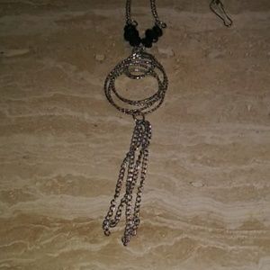 Silver tone adjustable necklace.